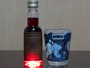 Singapore sling and shot glass